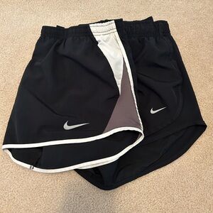 2 Nike shorts, Medium, in black and black with white trim & white/gray on side